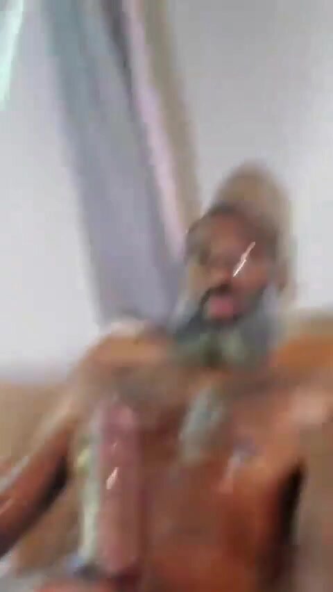 mature black bearded daddy jerking his bbc