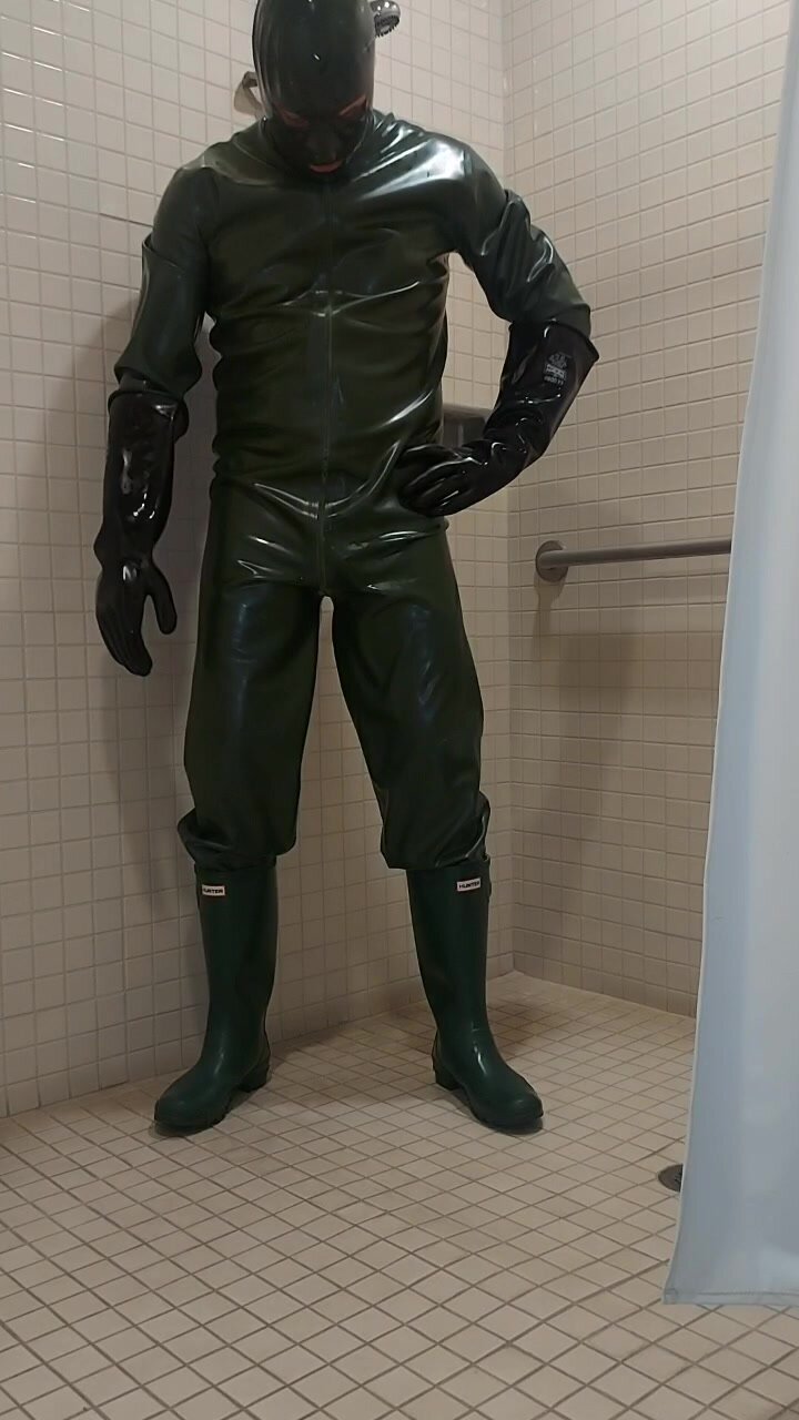 Pissing in my heavy rubber suit part 1