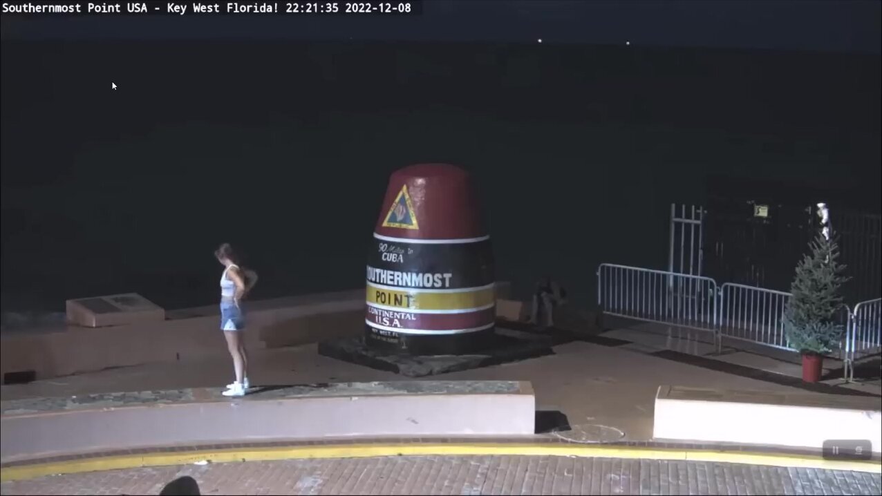 Lady gets caught pissing at southernmost Point