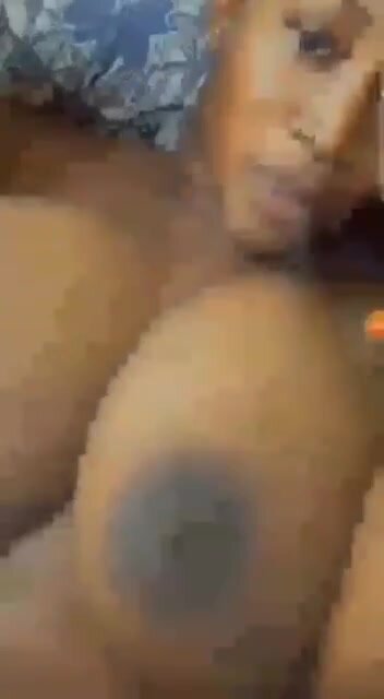 BBW Ebony Smoking Weed While Flaunting Her Breast