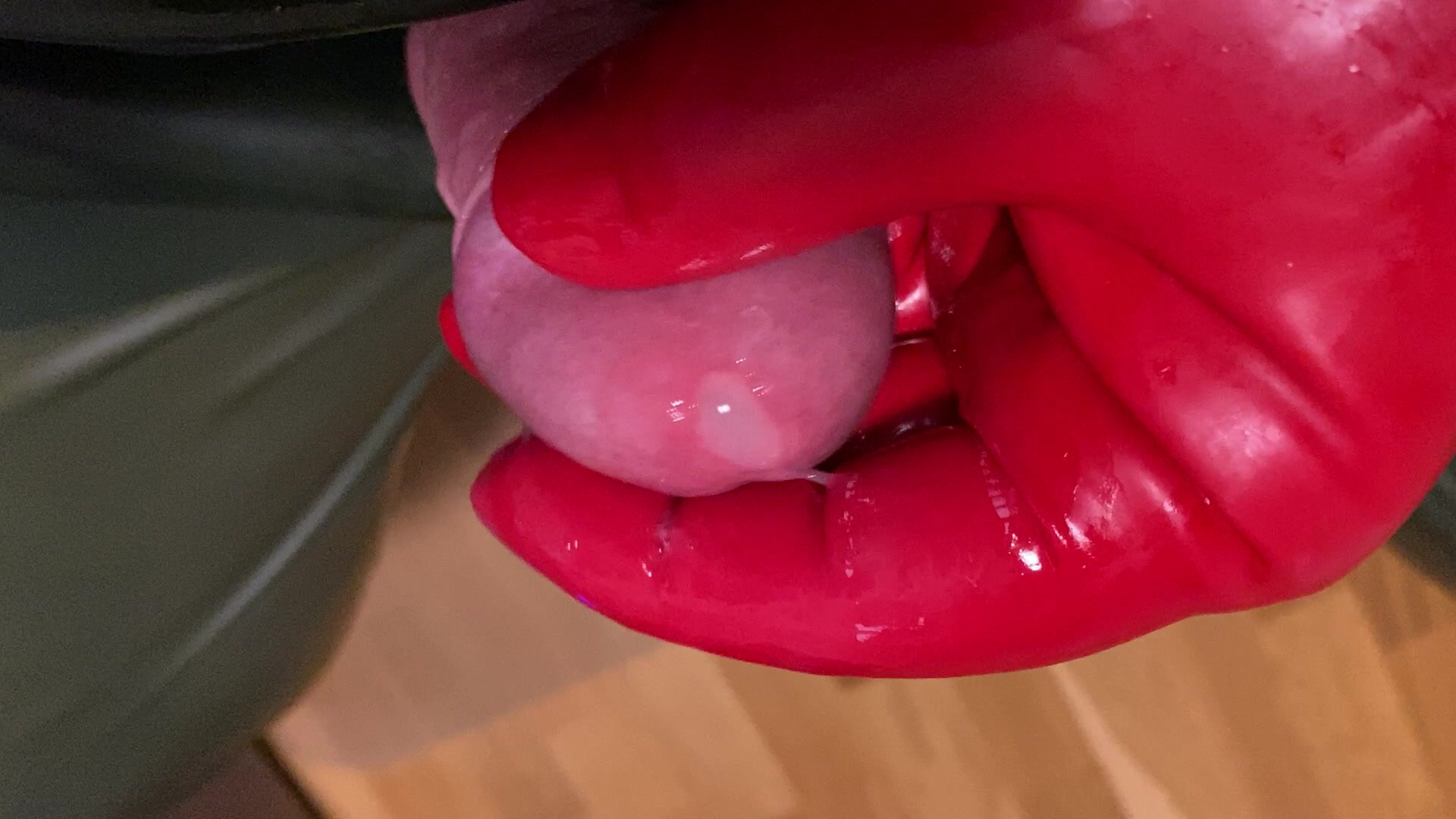 Cum smearing in red rubber gloves