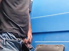Construction worker timing his piss break