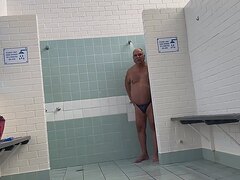 Grandpa taking a shower at the club and showing off.