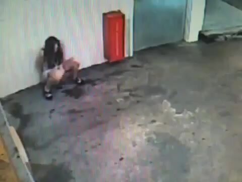 Drunk girl pissing caught on CCTV