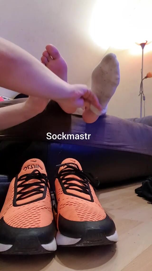 Guy massage his best friend’s feet
