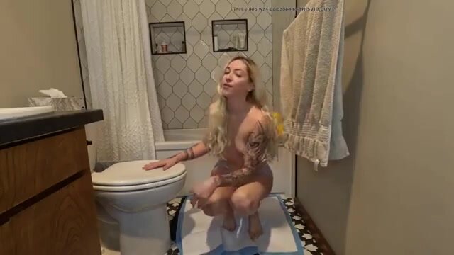 Blonde Girl Poops on Toilet