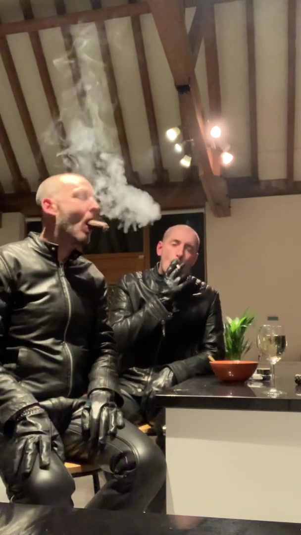 sexy leather couple smoke