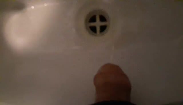 Pissing in the sink - video 14