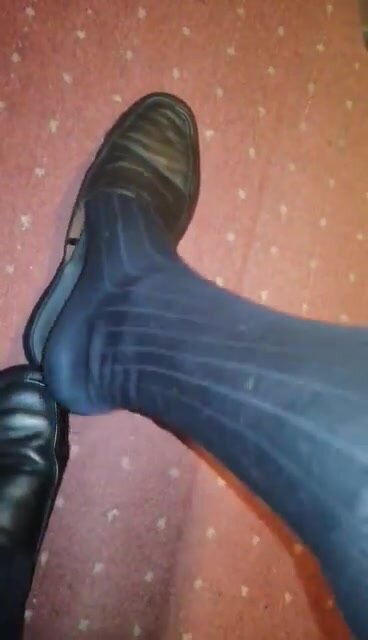 Leather slippers and long socks