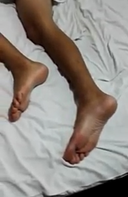 Sleeping male's feet