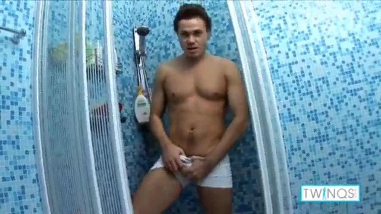 young man masturbates and shows his ass in the shower