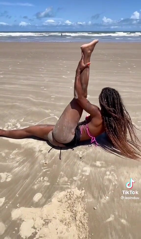Lady Farts While Doing Stretching On the Beach