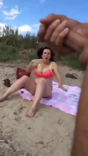 Horny beach perv scares innocent lady on the beach