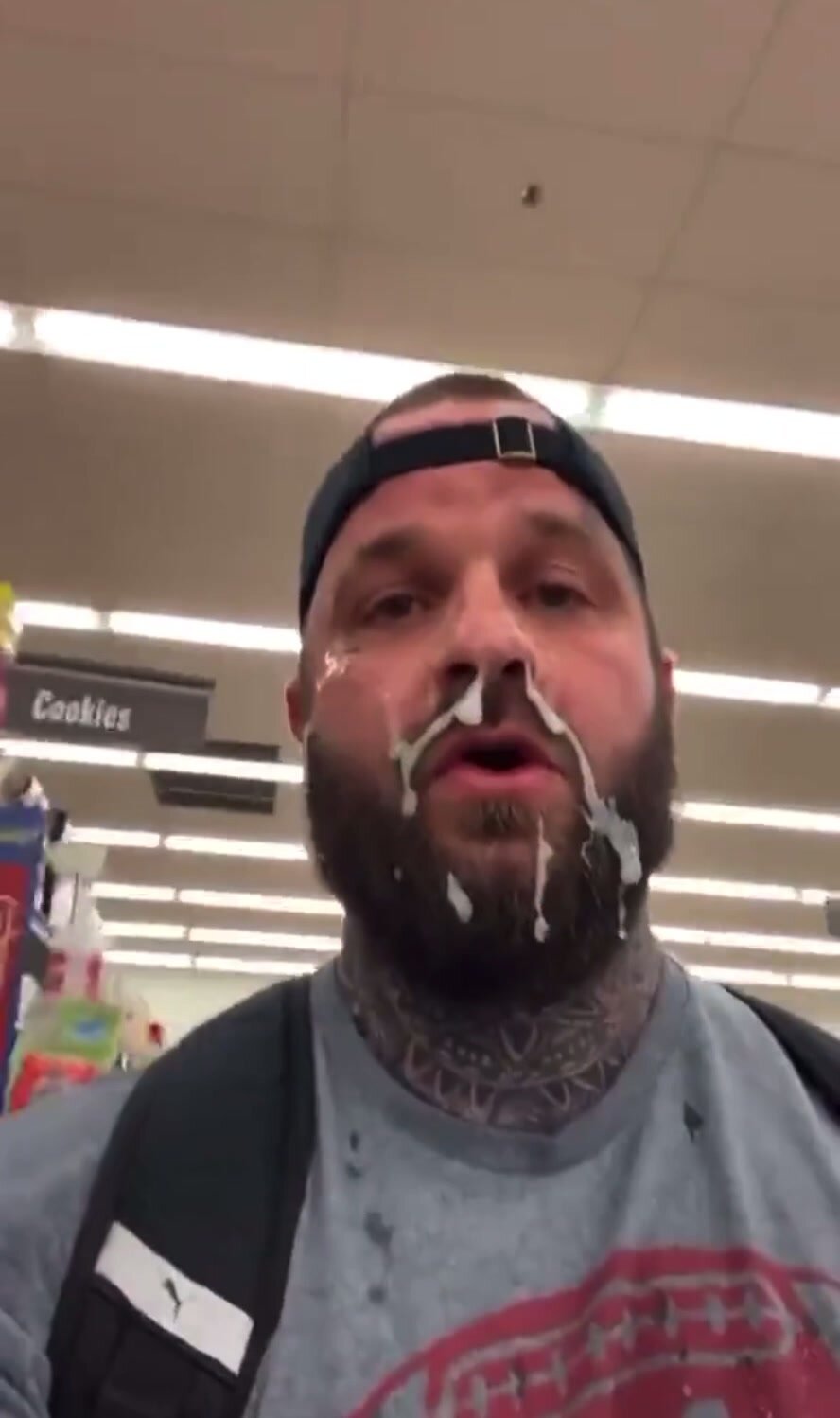 muscle fag walks around supermarket with facial