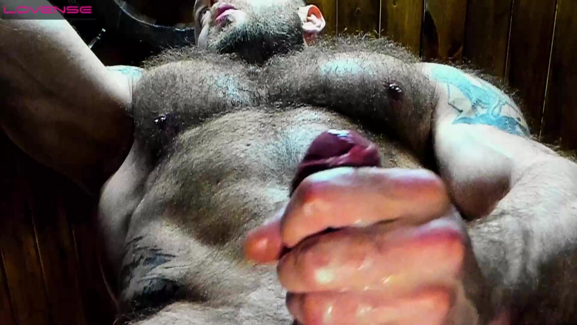 muscle hunk showing off big shiny cock