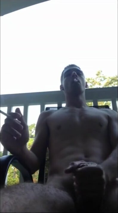 Fit guy, smoke, wank and cum on balcony