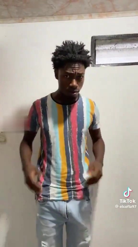african dude showing off his bulge in pants