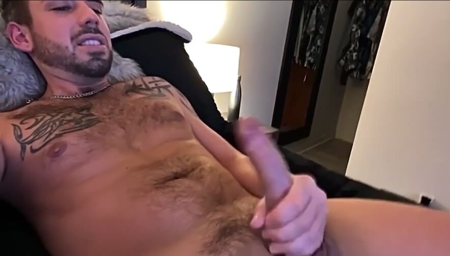 Sexy man is creaming his face with his cum