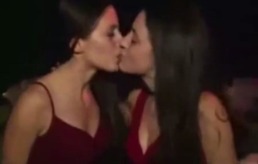 Twin sisters make out