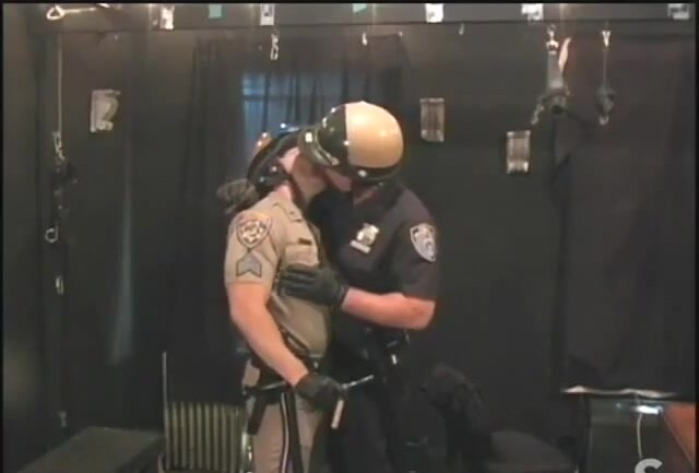 Just Two policeman are smoking and kiss
