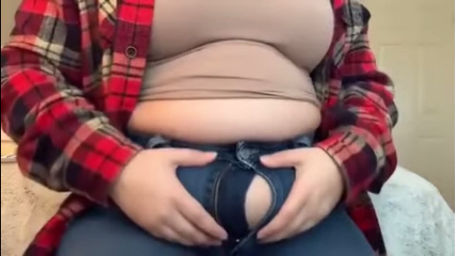 Big belly in jeans