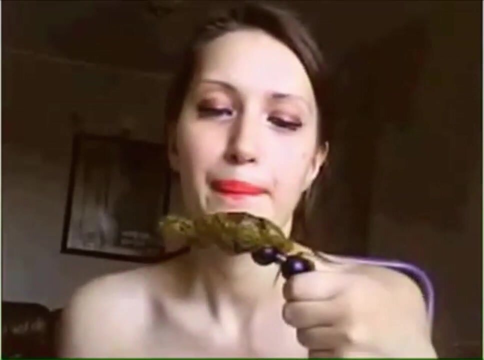 Eating her scat off anal beads