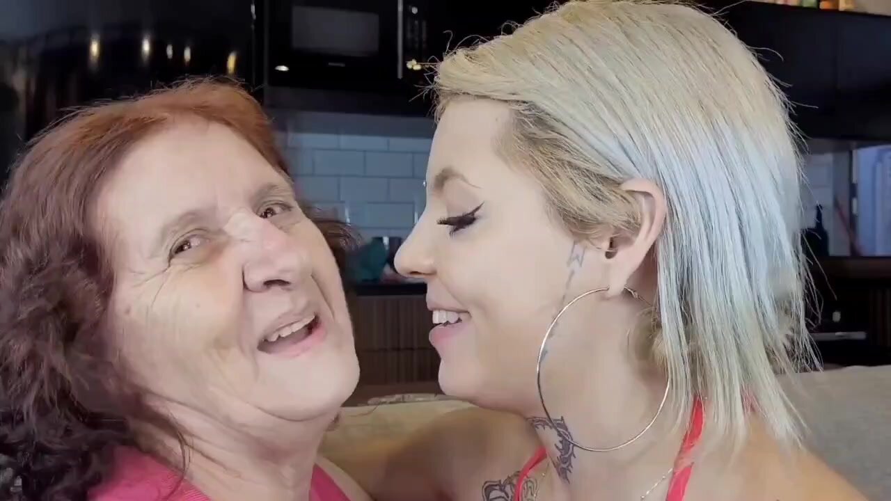 grandmother and granddaughter kissing tongue
