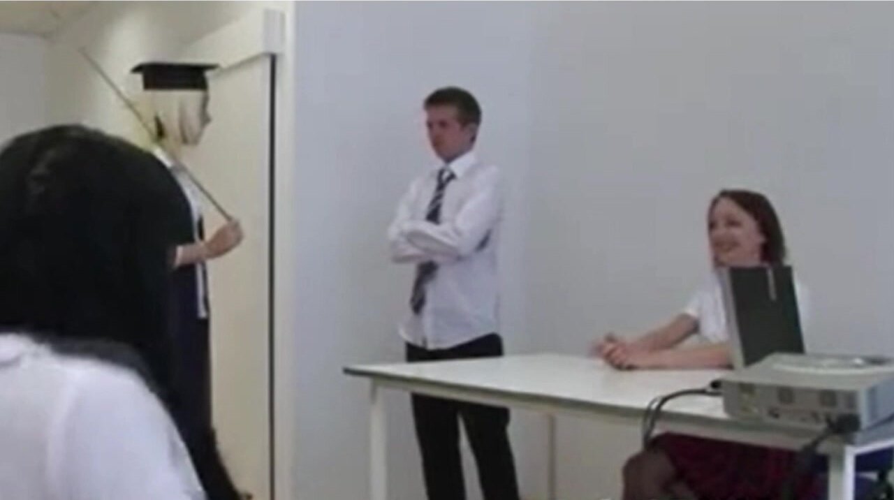 Guy has to strip in front of female classmates
