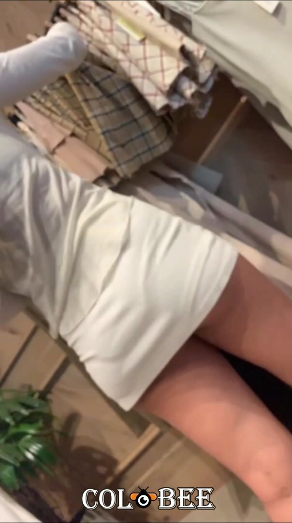 Asian coworker with sexy short dress upskirt
