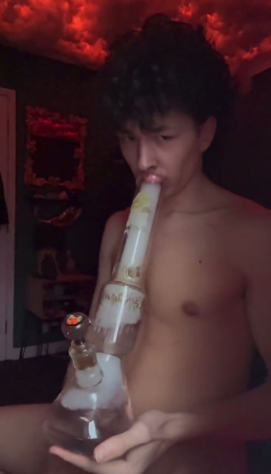 sexy lad smokes bong  touching his dick