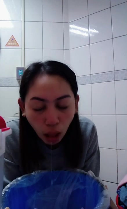 Asian girl pukes - video 3