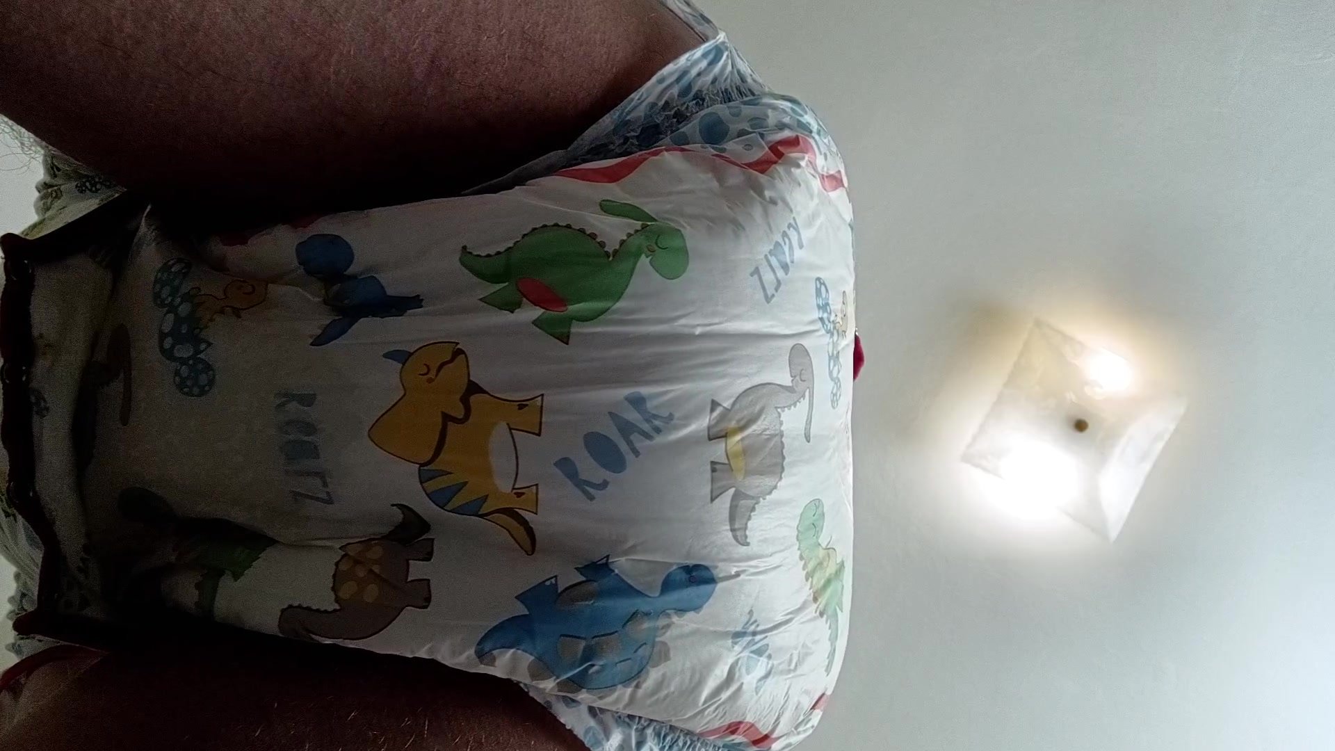 Boy wets and messes his diaper - video 2