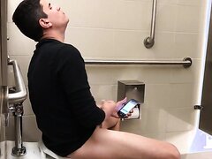Dude gets caught jerking in public bathroom