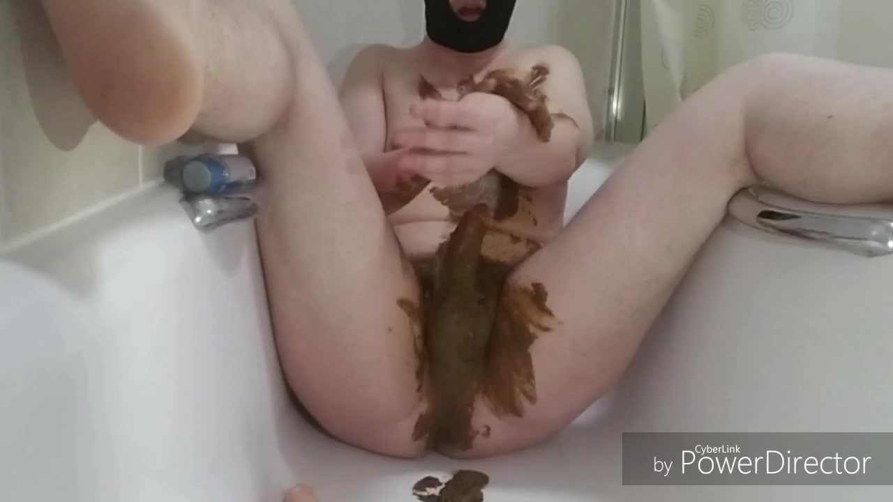 Having fun with poop and dildo in bathtub