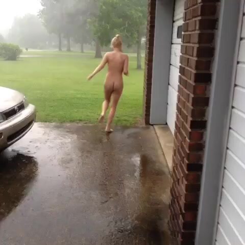 Girl streaks in rain