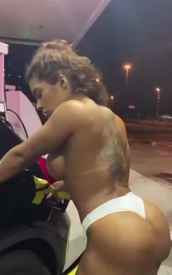 Sexy body babe pumps gas topless