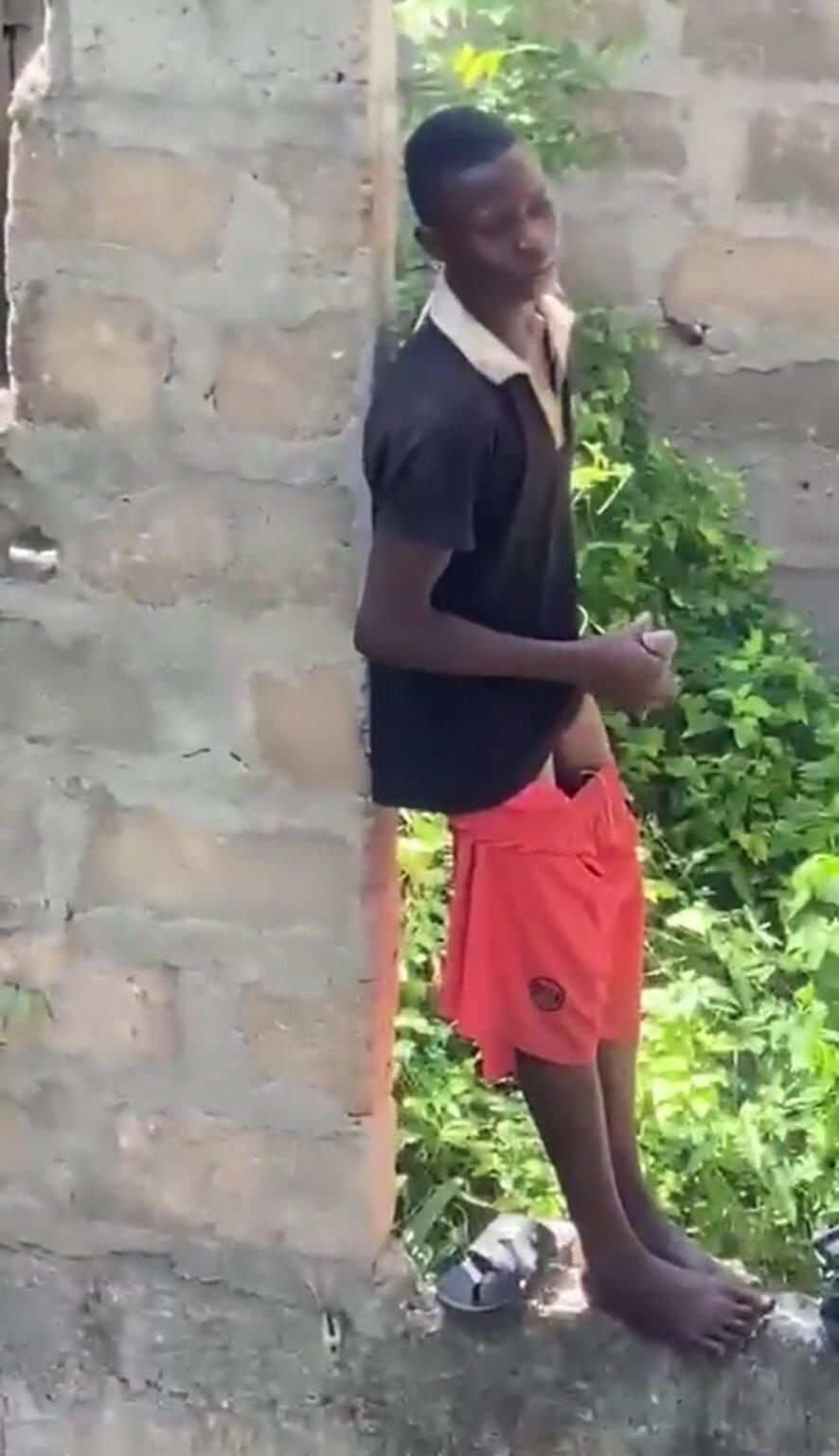 African caught wanking outside