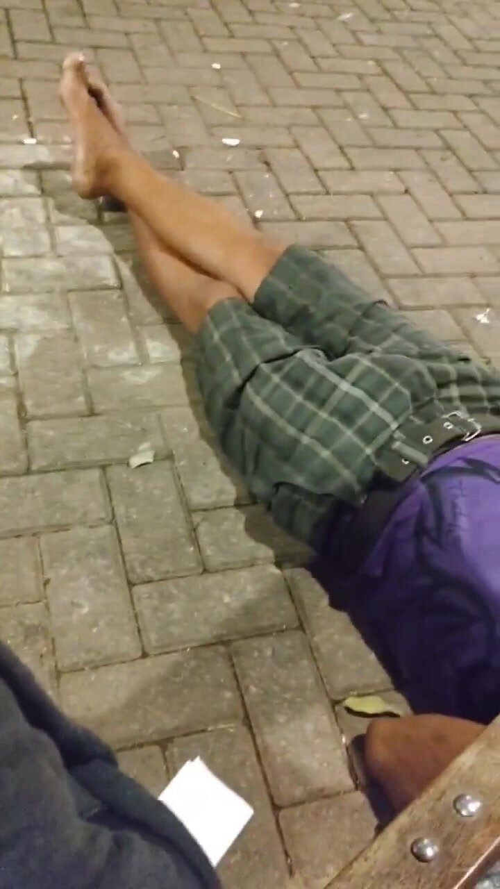 fag plays with sleeping homeless man's cock