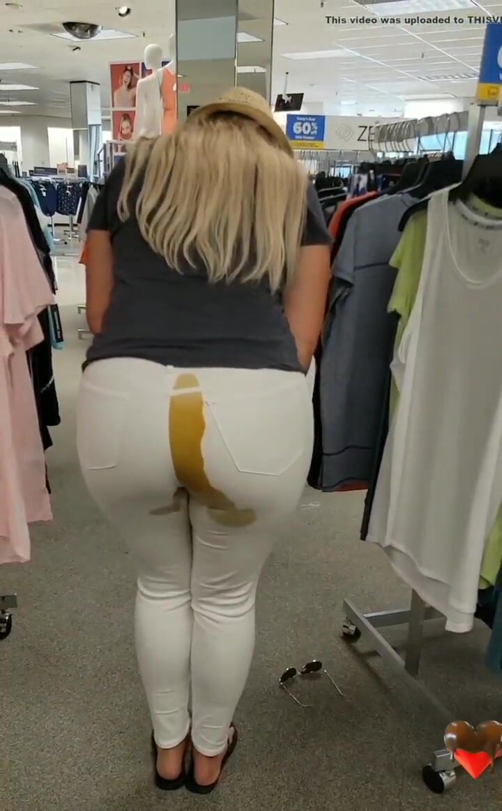 girl shitting in a store
