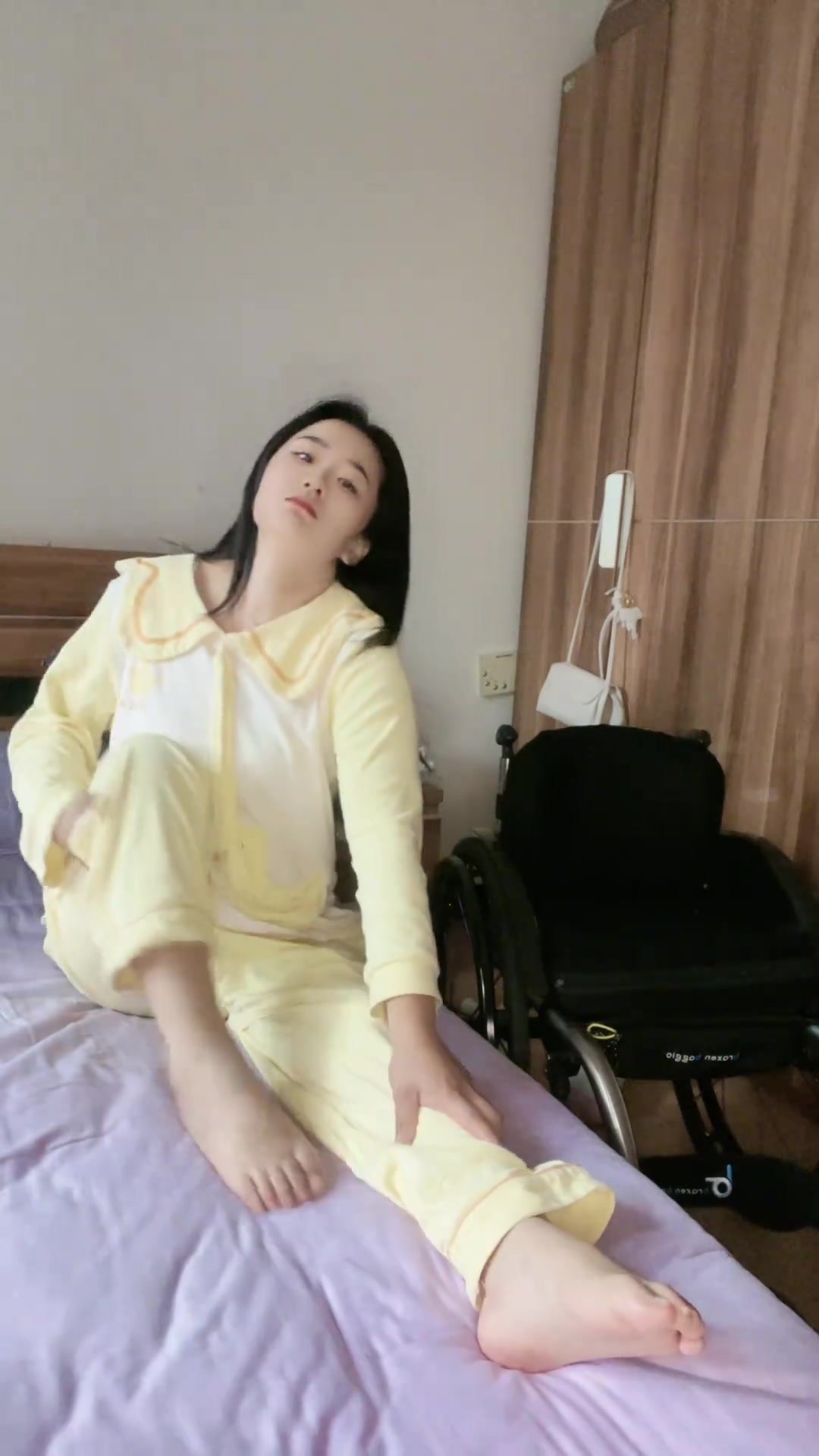 Paraplegic on bed