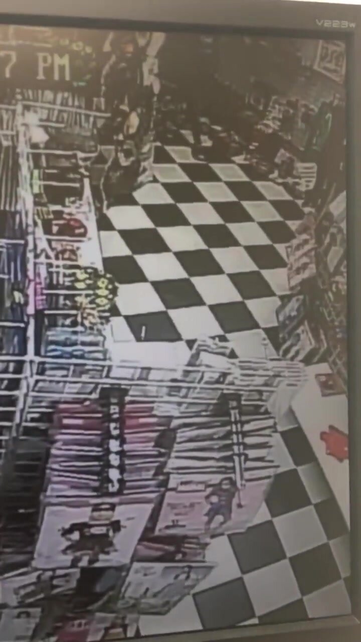Store cctv catches customer urinating on stores floor