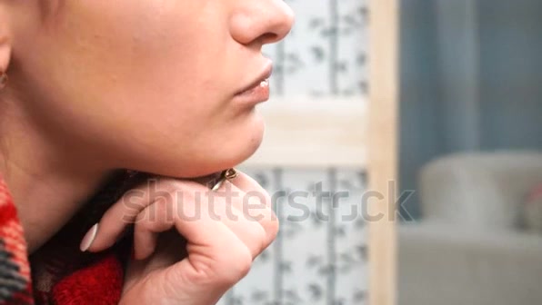 girl swallowing pill without water