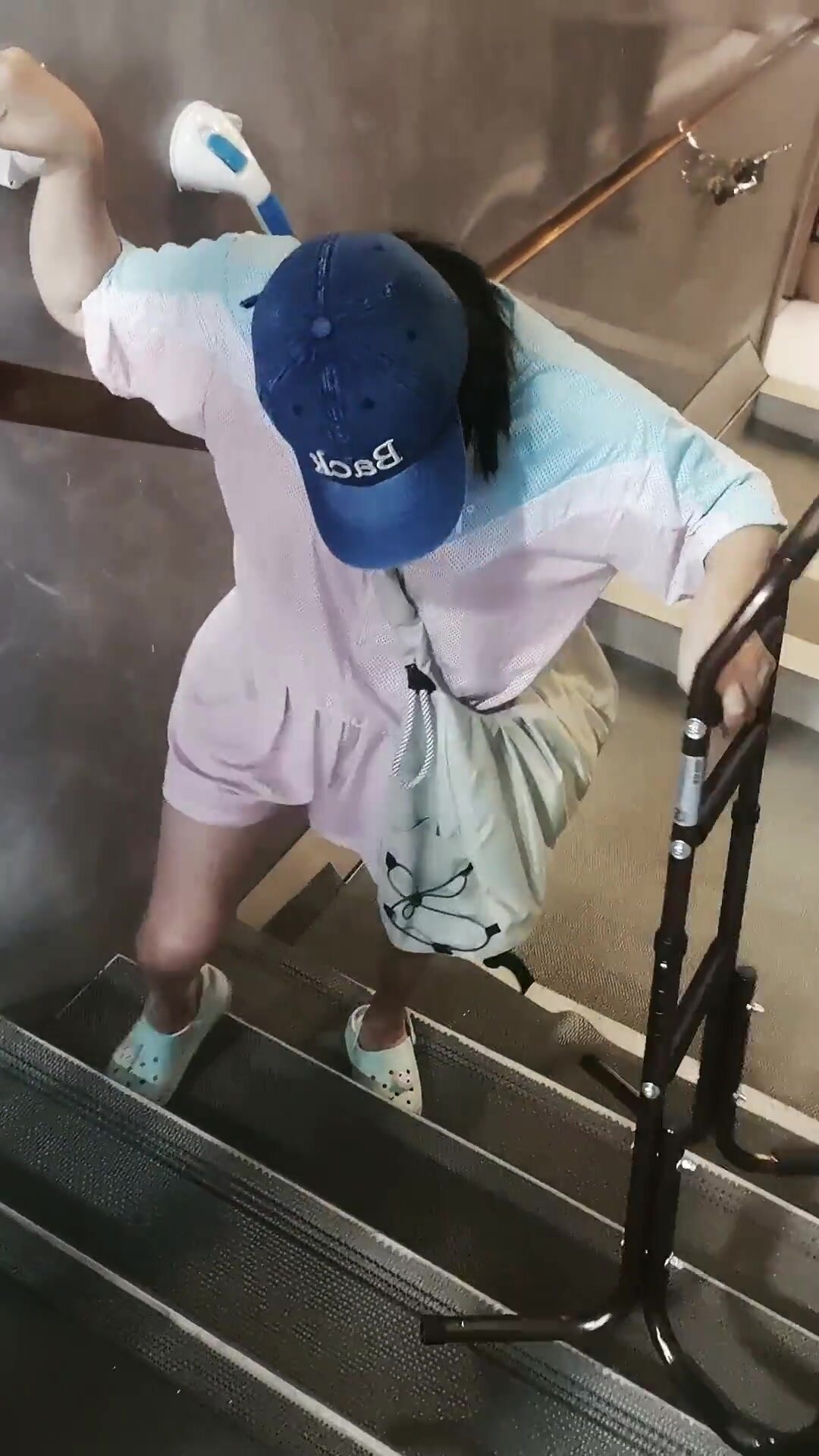 Spastic Asian up the stairs
