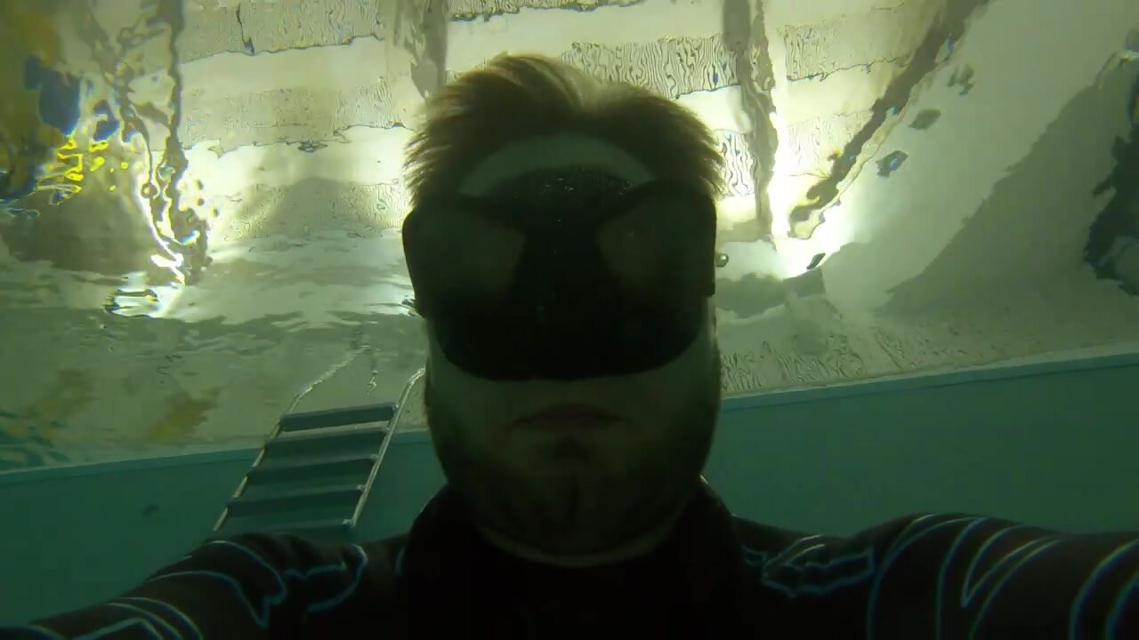 German freedivers training underwater in pool - video 2