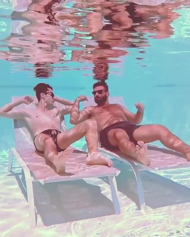 Cuties relaxing underwater in pool