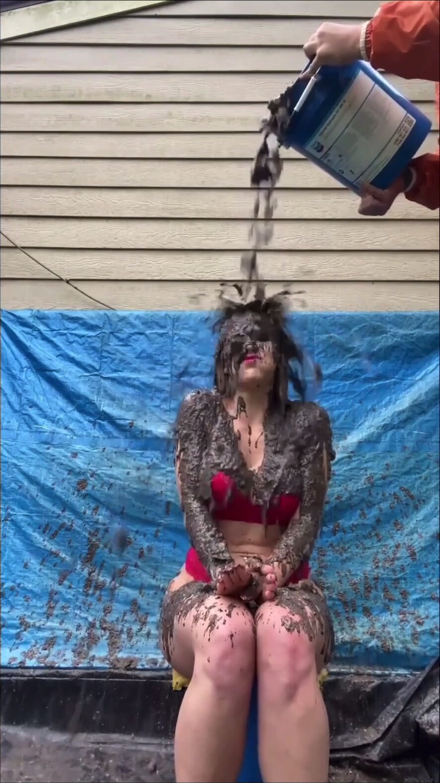 Blonde gets covered in mess