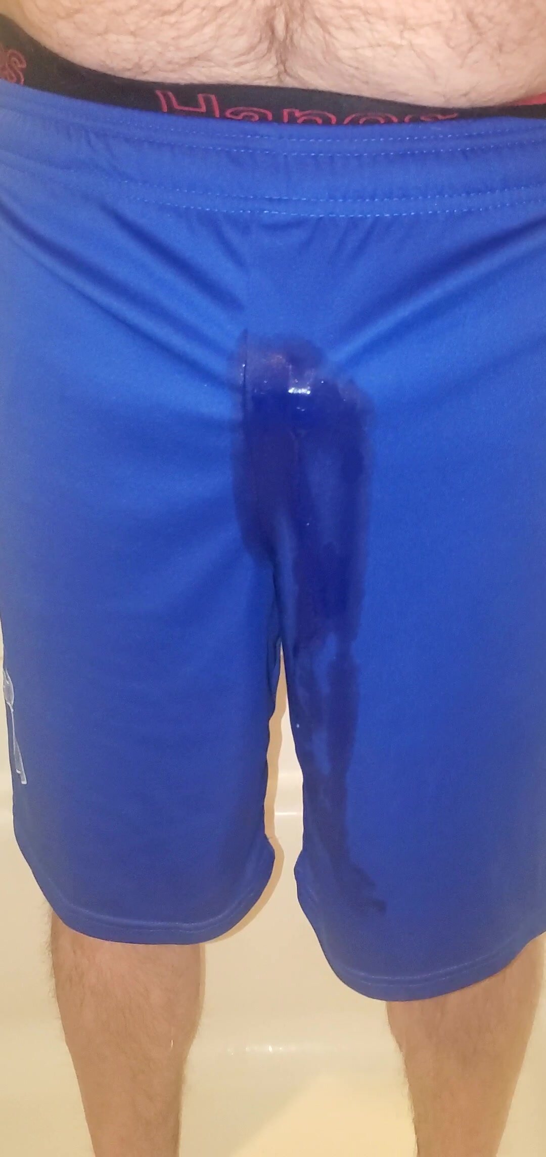 Wetting blue UA shorts and hanes