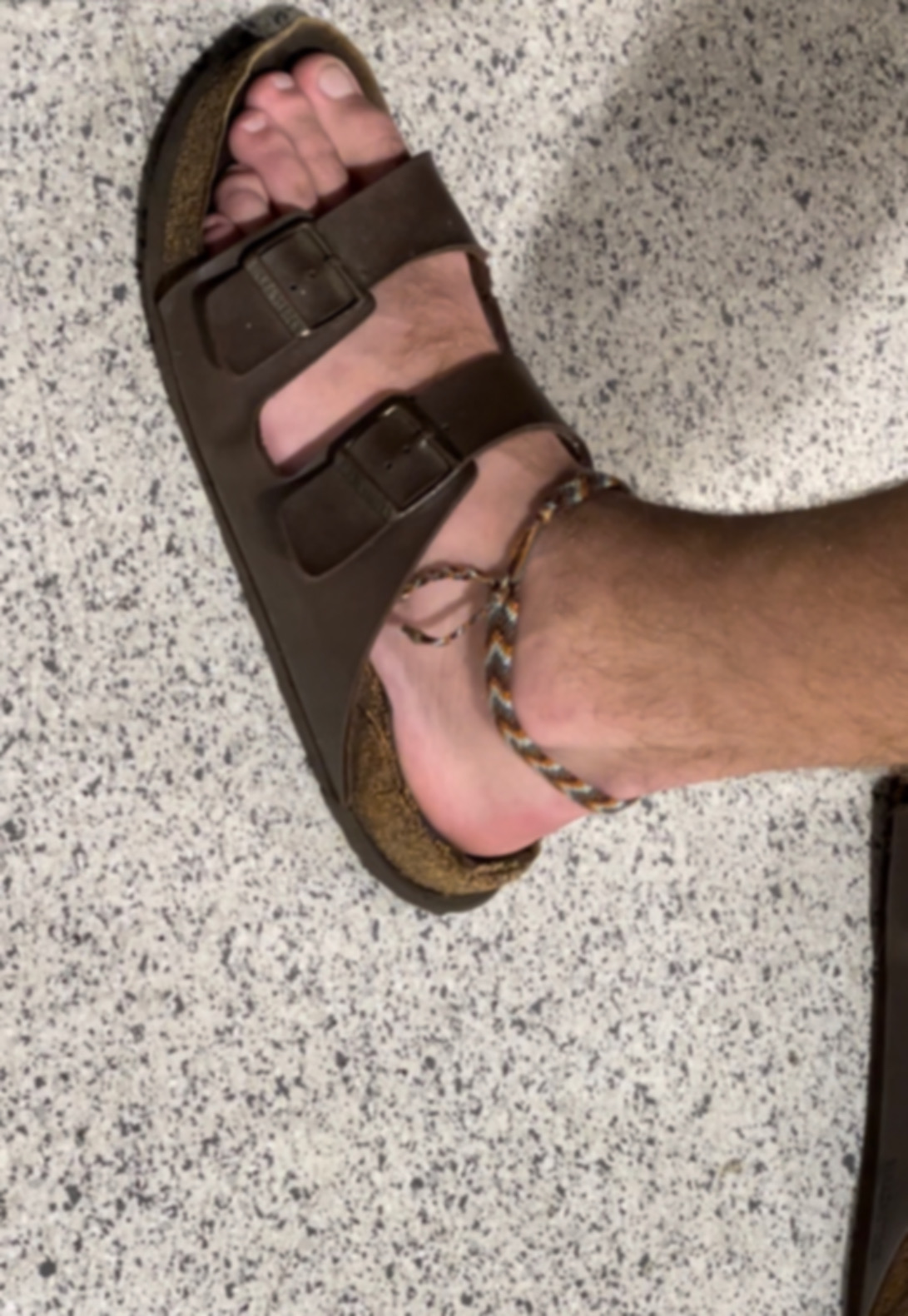 Gorgeous masculine feet In sandals