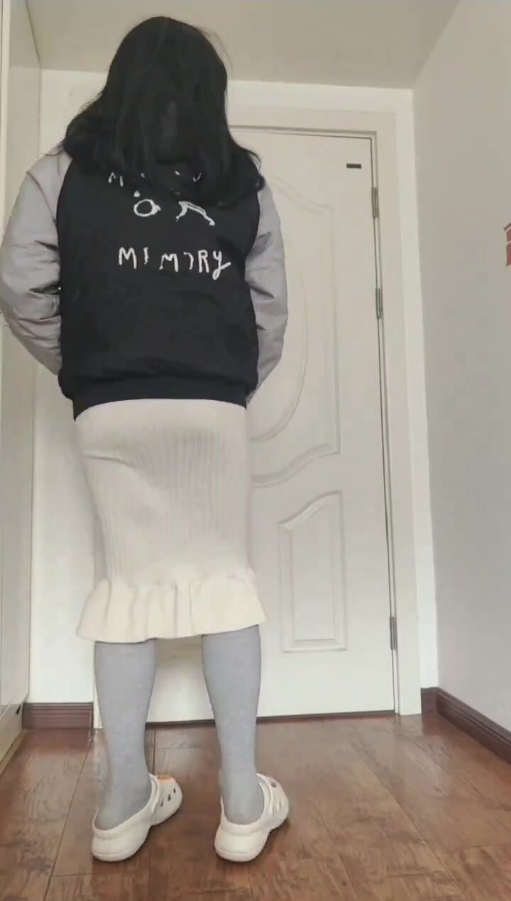 Chinese college girl wetting long dress and leggings