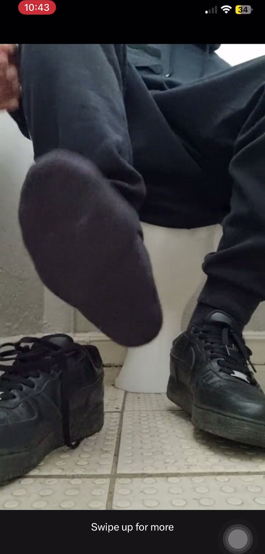 Black guy shows off his black socks in ... airforces
